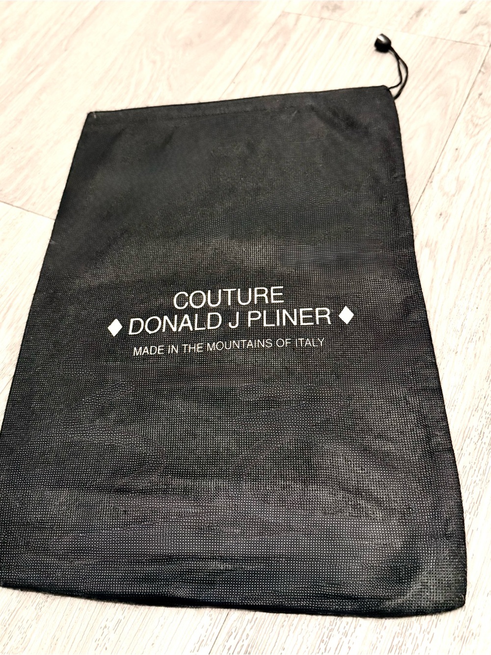 Couture Donald J. Pliner black drawstring dust bag with gold logo 14.5x10”